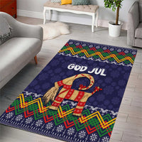 Dark blue Christmas area rug showing God Jul text, zigzag trim, and folk goat graphic