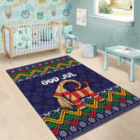 Dark blue Christmas area rug with God Jul wording, snowflake border, and goat motif