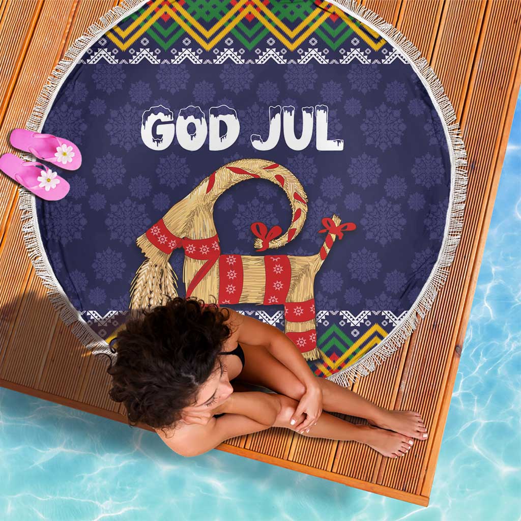 Round dark blue 'GOD JUL' beach blanket with fringe border and Scandinavian folk goat design