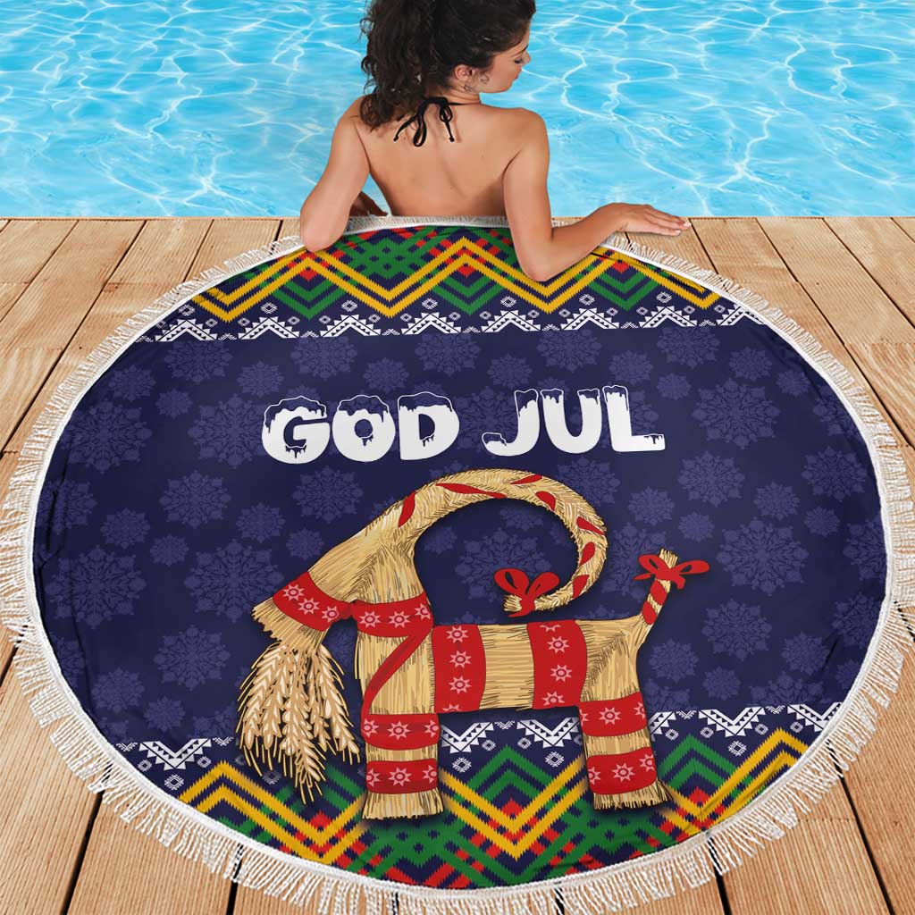 Round dark blue 'GOD JUL' beach blanket with fringe edge, goat and colorful patterned band