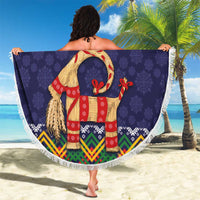 Dark blue round beach blanket with fringe border, 'GOD JUL' goat figure and folk motifs