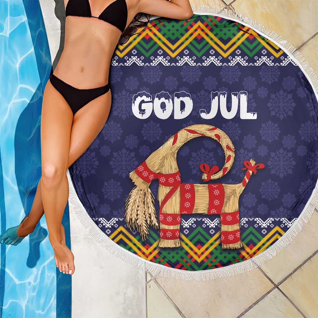 Round dark blue beach blanket with fringe edge, 'GOD JUL' goat, and red gift accents