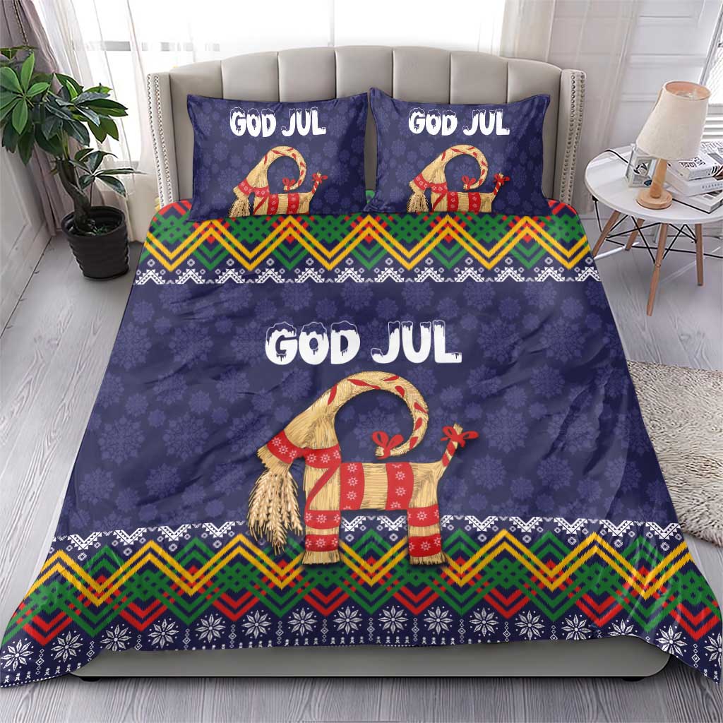Dark blue duvet and pillow set with 'GOD JUL' lettering, red goat design, and zigzag border