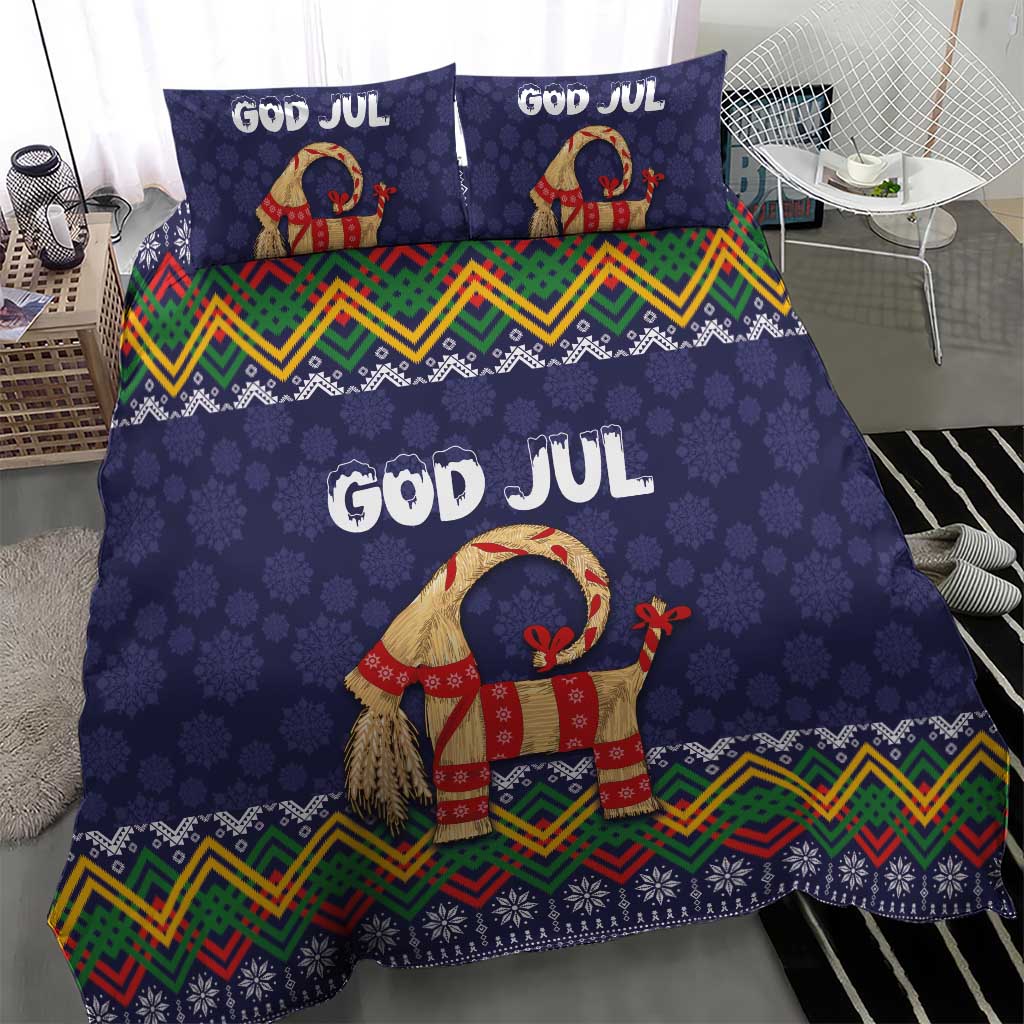 Dark blue Christmas bedding set showing 'GOD JUL' text and red-dressed goat with folk trim