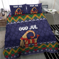 Dark blue Christmas bedding set showing 'GOD JUL' text and red-dressed goat with folk trim