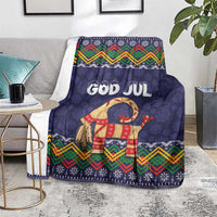 Dark blue Christmas blanket with GOD JUL text, goat image, and festive multicolor stripe pattern