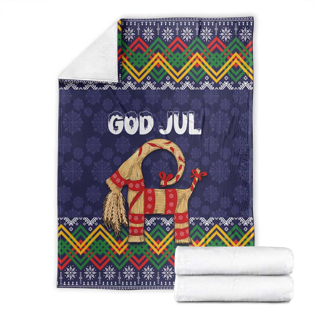 Dark blue Christmas blanket with goat and GOD JUL, zigzag and snowflake pattern edges