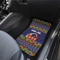 Dark blue car floor mat with folk pattern goat figure and 'GOD JUL' text