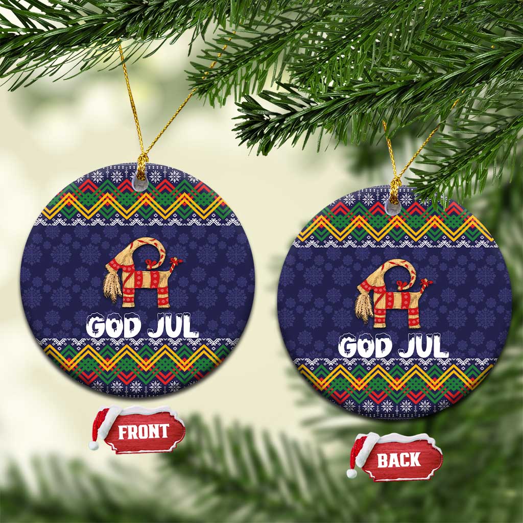 Set of two dark blue round ceramic ornaments with “GOD JUL” goat design, front and back sides