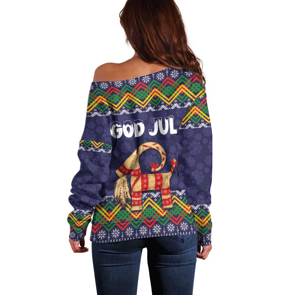 Women’s dark blue off-shoulder sweater with colorful folk pattern and goat graphic