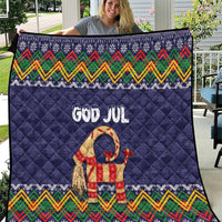 Dark blue Christmas quilt with quilted texture, “God Jul” text, and goat motif