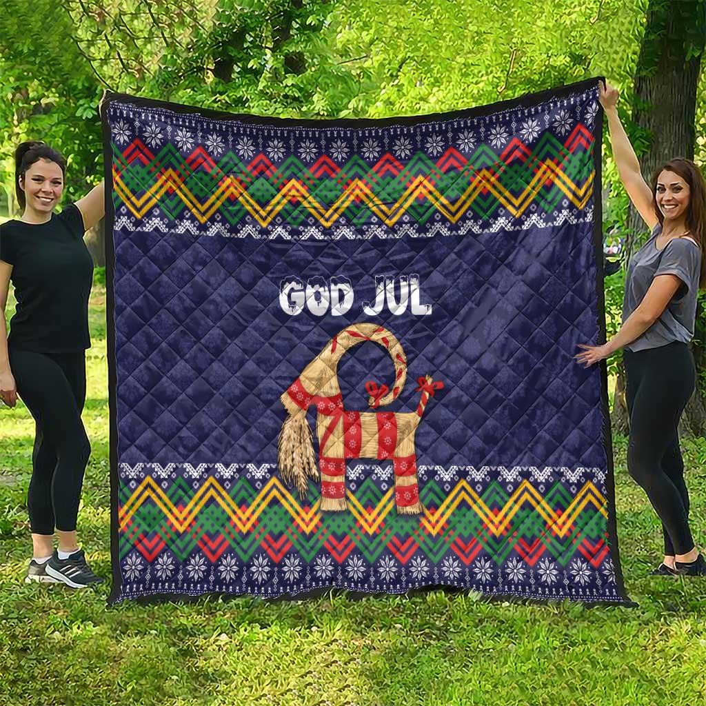 Dark blue quilt with “God Jul” and a decorated goat, multicolor Scandinavian zigzag border