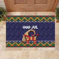 Dark blue Christmas rubber doormat with God Jul goat figure and folk border pattern