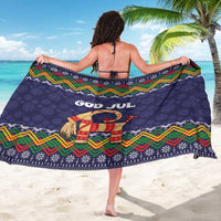 Dark blue Christmas sarong, “GOD JUL” and goat print with colorful zigzag trim
