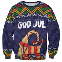 Dark blue Christmas sweatshirt with folk trim, 'God Jul' text and goat graphic