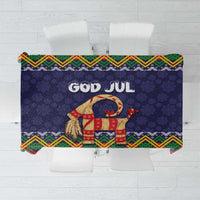 Dark blue Christmas tablecloth with 'God Jul' lettering and folk goat scene, patterned border