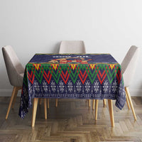 Dark blue Christmas tablecloth with multicolor chevron top band and folk pattern for table