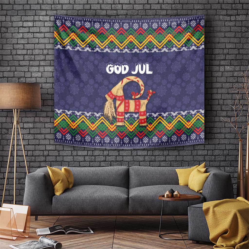 Dark blue tapestry with 'GOD JUL' and dressed goat, zigzag folk border