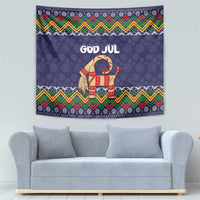 Dark blue tapestry with 'GOD JUL' goat motif and colorful Nordic pattern border