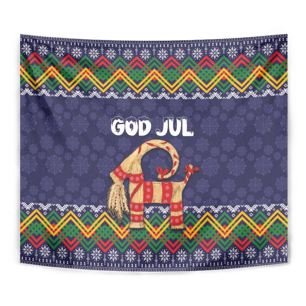 Dark blue tapestry close-up with 'GOD JUL', folk goat figure, and zigzag trim