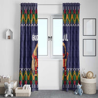 Dark blue “God Jul” Christmas window curtains with Nordic zigzag border and goat figure, pair view.