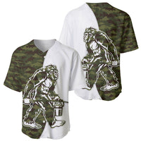 Two baseball jerseys with Bigfoot graphic, one white with camo green panel, one camo