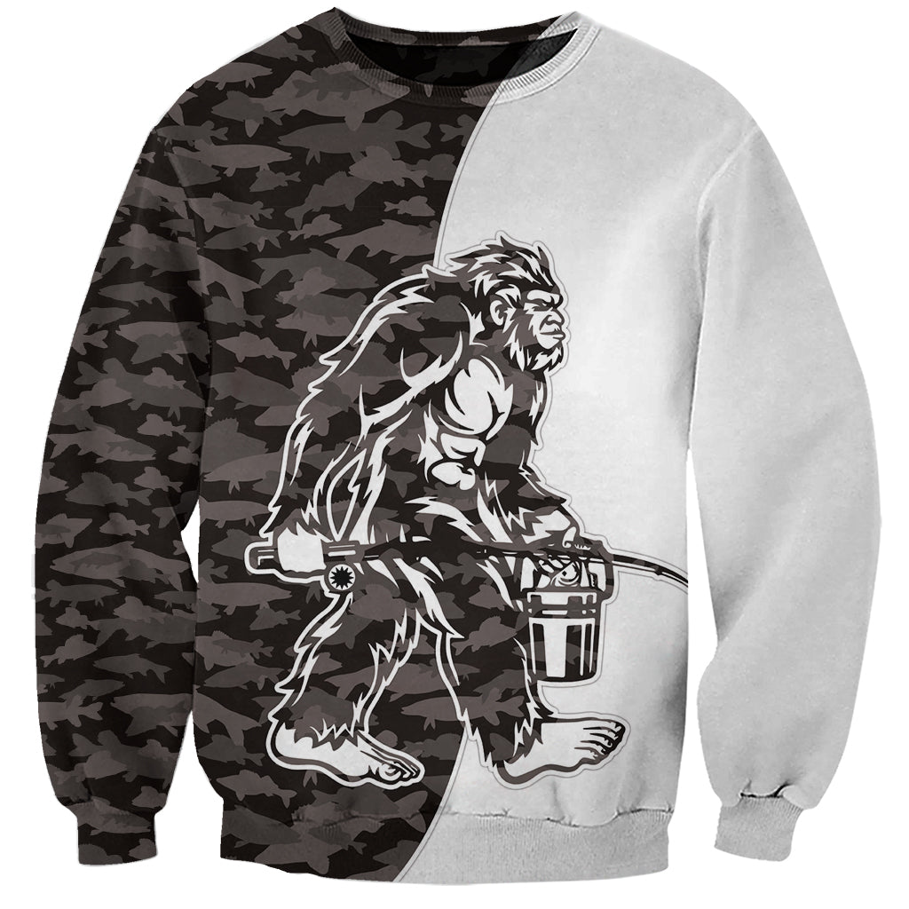 Two-tone gray sweatshirt with black camouflage print and Bigfoot graphic on front