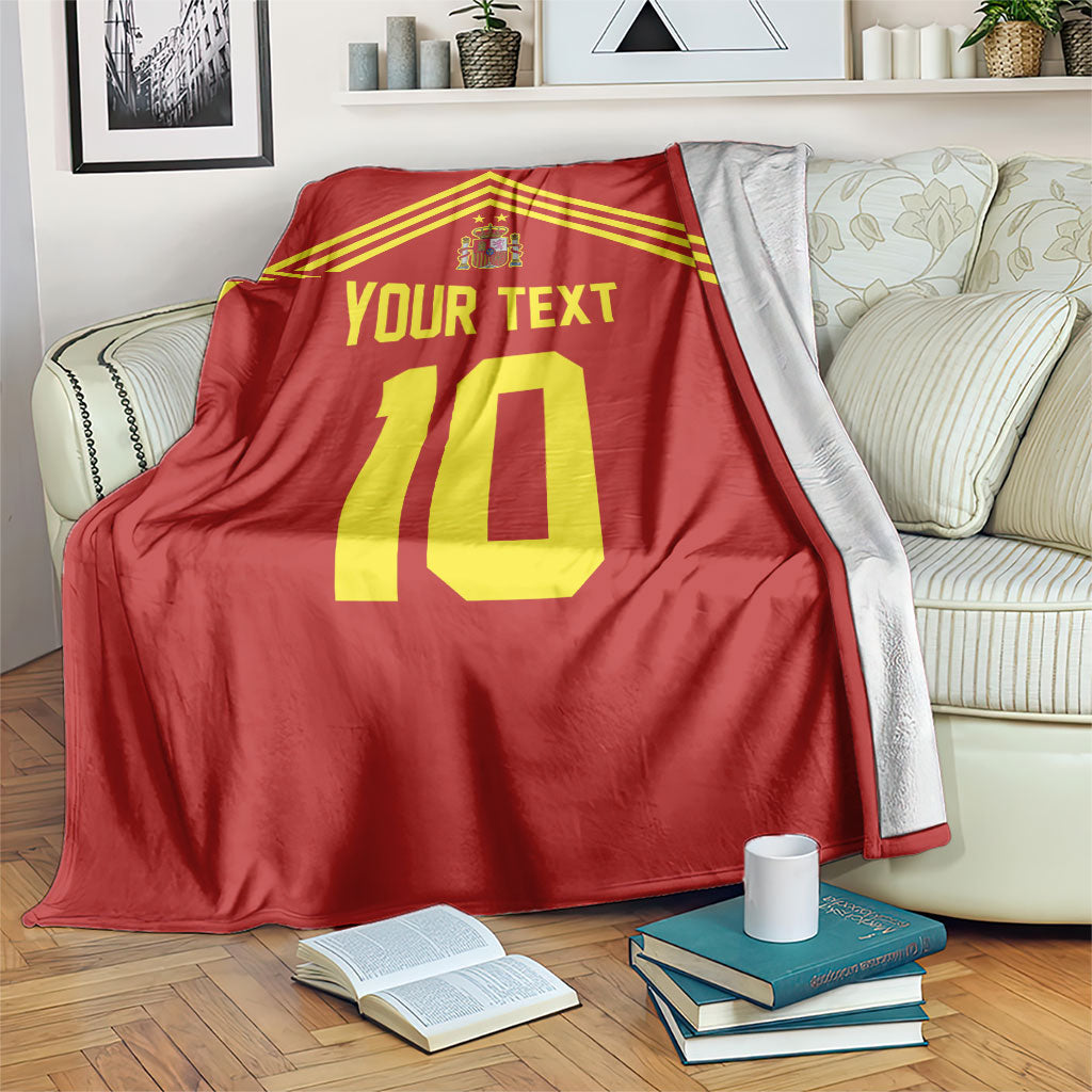Red football-style blanket with yellow stripes, crest, and large number 10 design