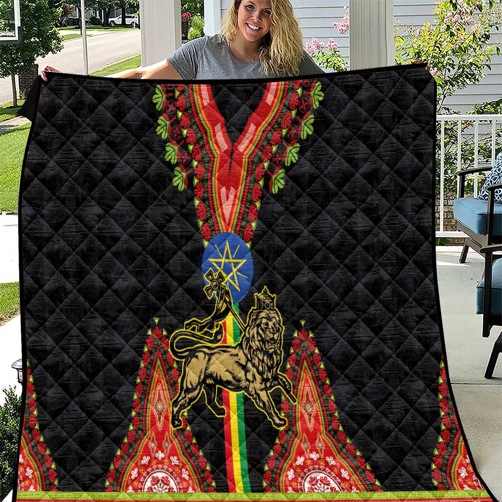 Black quilted throw blanket with gold lion, blue star, and red dashiki-style trim
