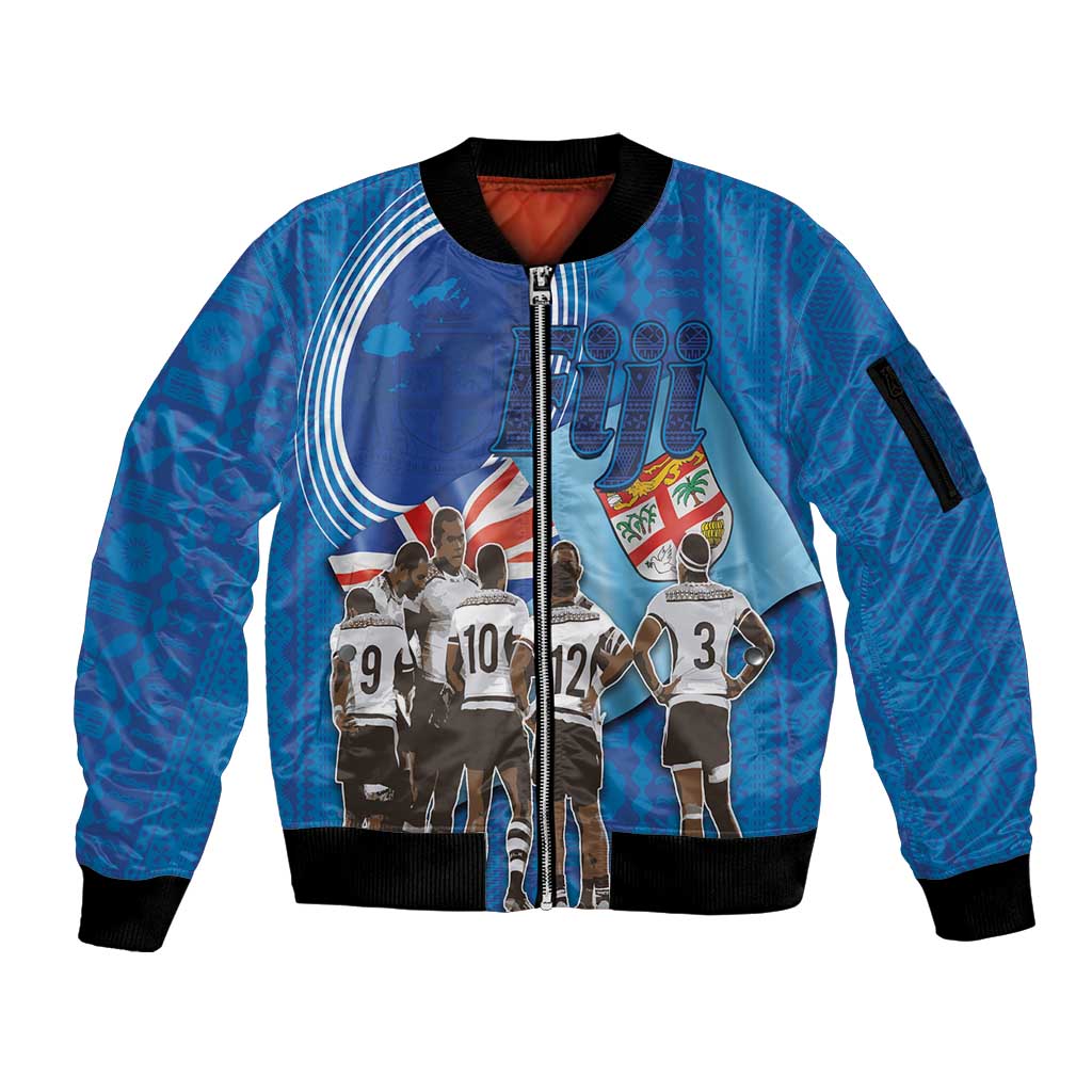 Blue bomber jacket with full zip, ribbed cuffs, and rugby team graphic on front