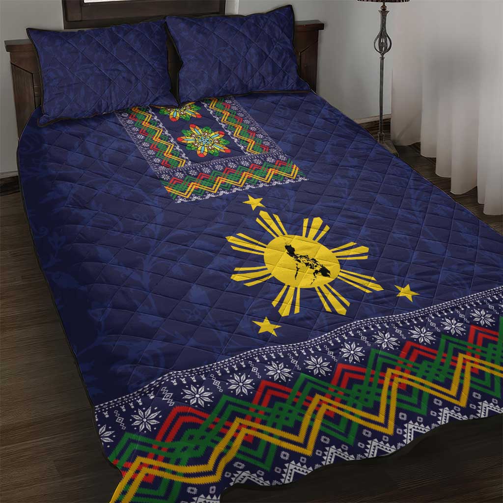 Blue quilt bed set with parol star motifs and colorful patterned border, with 2 pillowcases