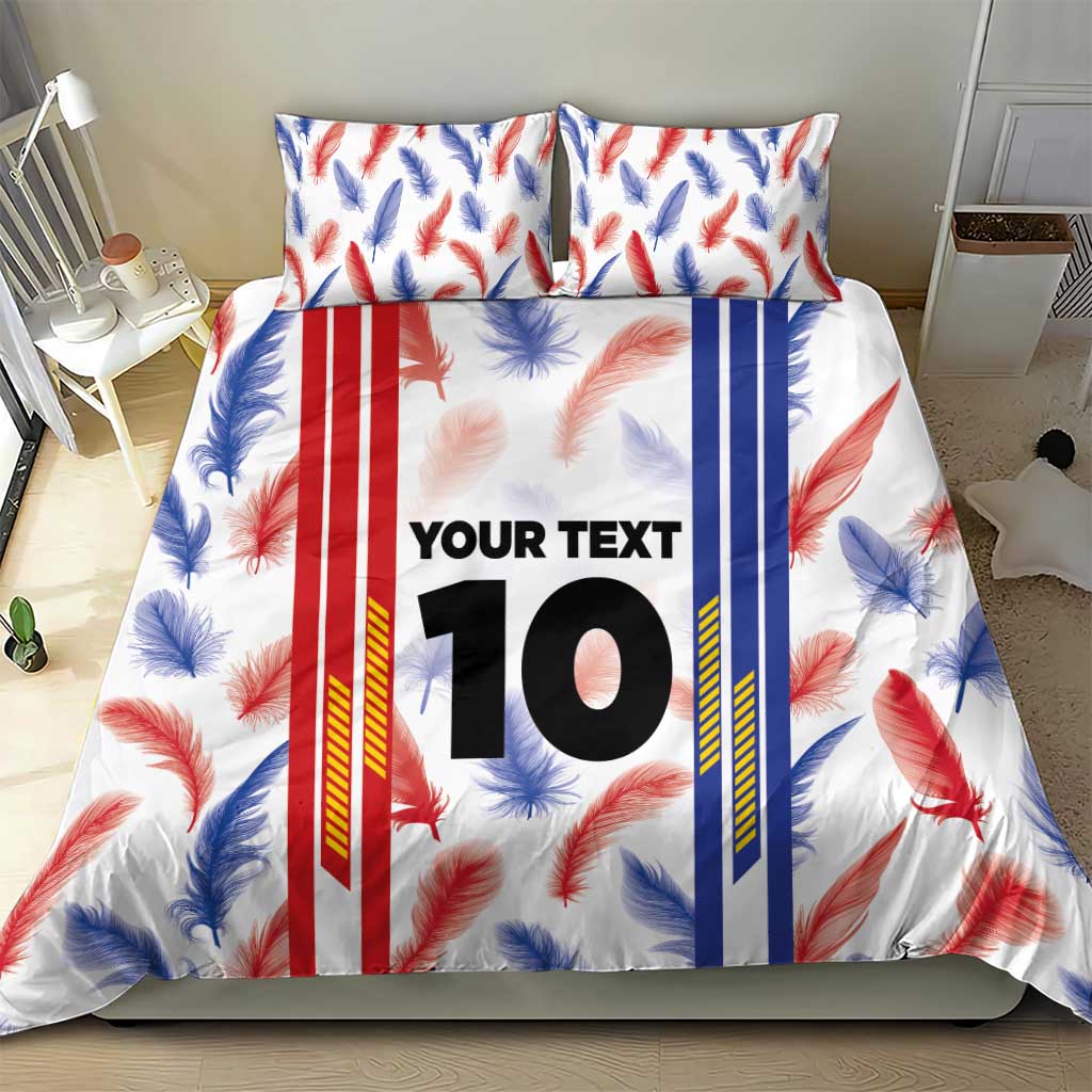 Duvet cover set with feather print and vertical stripe panels, featuring custom “YOUR TEXT” 10