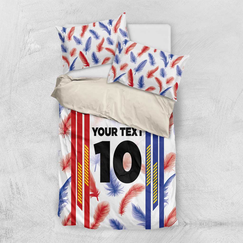 Bedding set with white duvet and feather print; two pillowcases with matching custom “YOUR TEXT” 10
