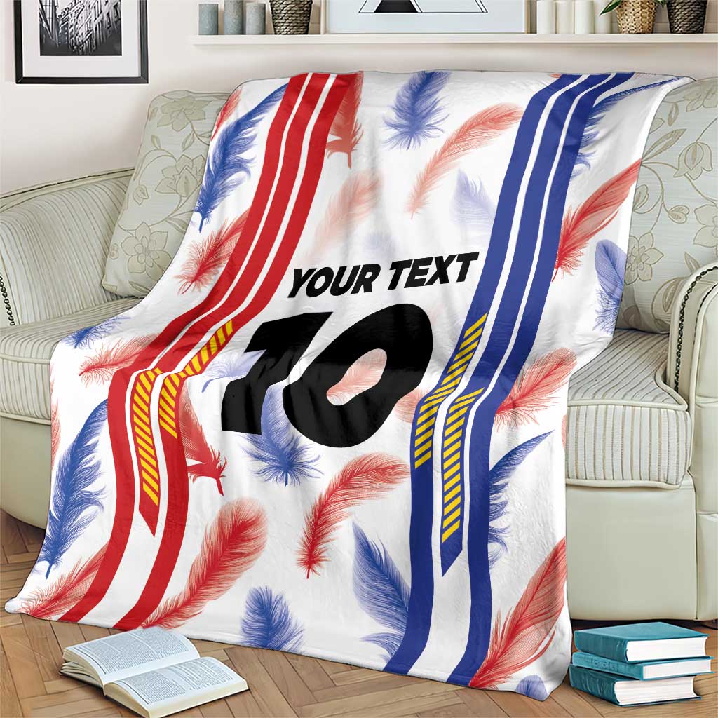 White custom jersey blanket draped with red blue stripes, feather print, and "YOUR TEXT 10".