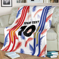 White custom jersey blanket draped with red blue stripes, feather print, and "YOUR TEXT 10".