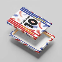 Canvas wall art on stacked supports, red and blue feather design with number 10