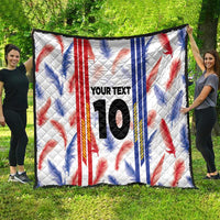 White leaf-pattern quilt blanket with red-blue stripes, “YOUR TEXT”, and large number 10