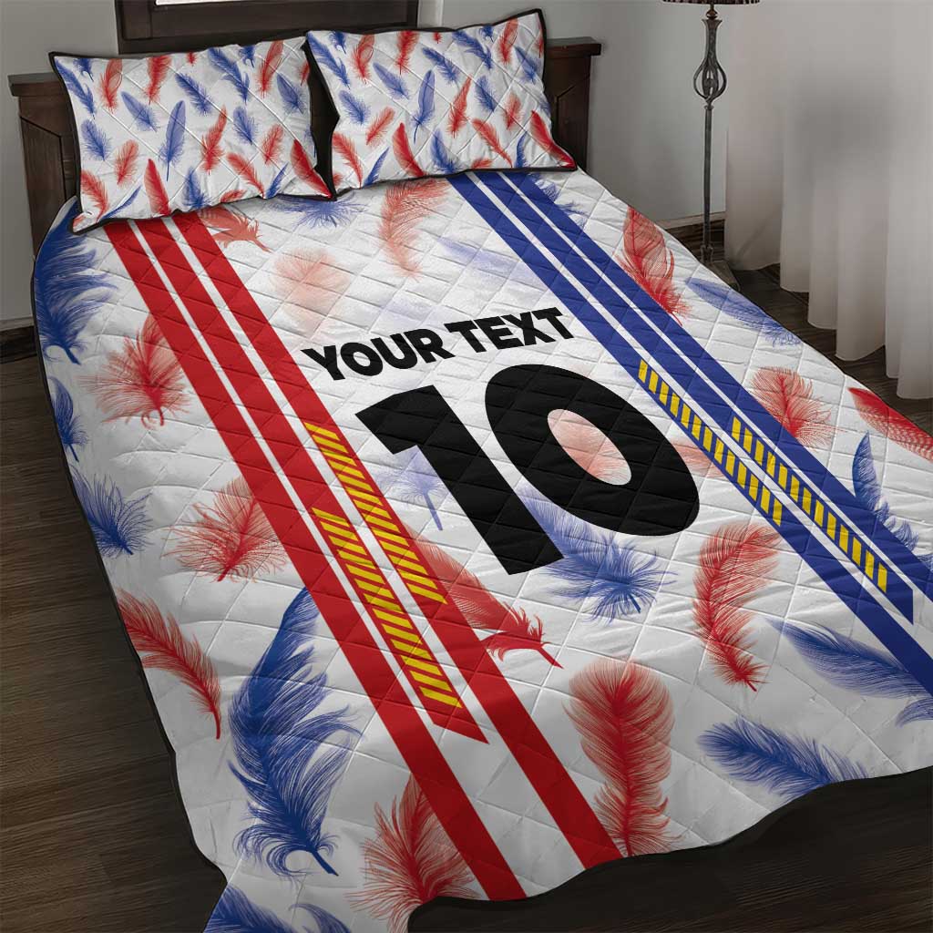 Quilt bed set with pillowcases, white feather print, red/blue stripes, large black '10'