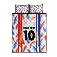 Quilt bed set with pillowcases, white feather pattern, bold red and blue stripes, 'YOUR TEXT 10'