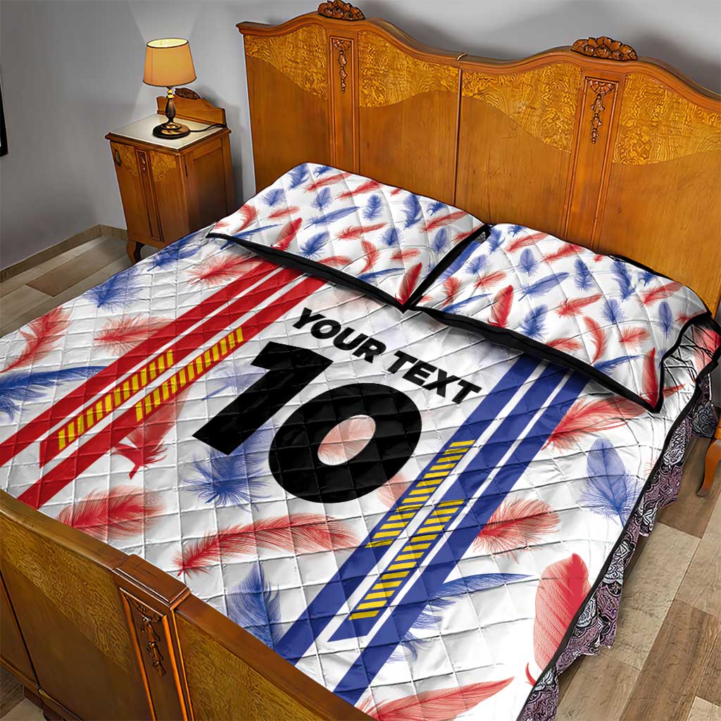 Quilt bed set with pillowcases, white feather print, diagonal red/blue stripe design, '10' center