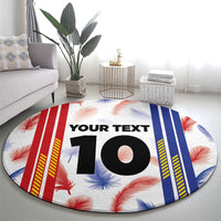 Round sports jersey graphic rug with red, blue, white stripes and large “10”