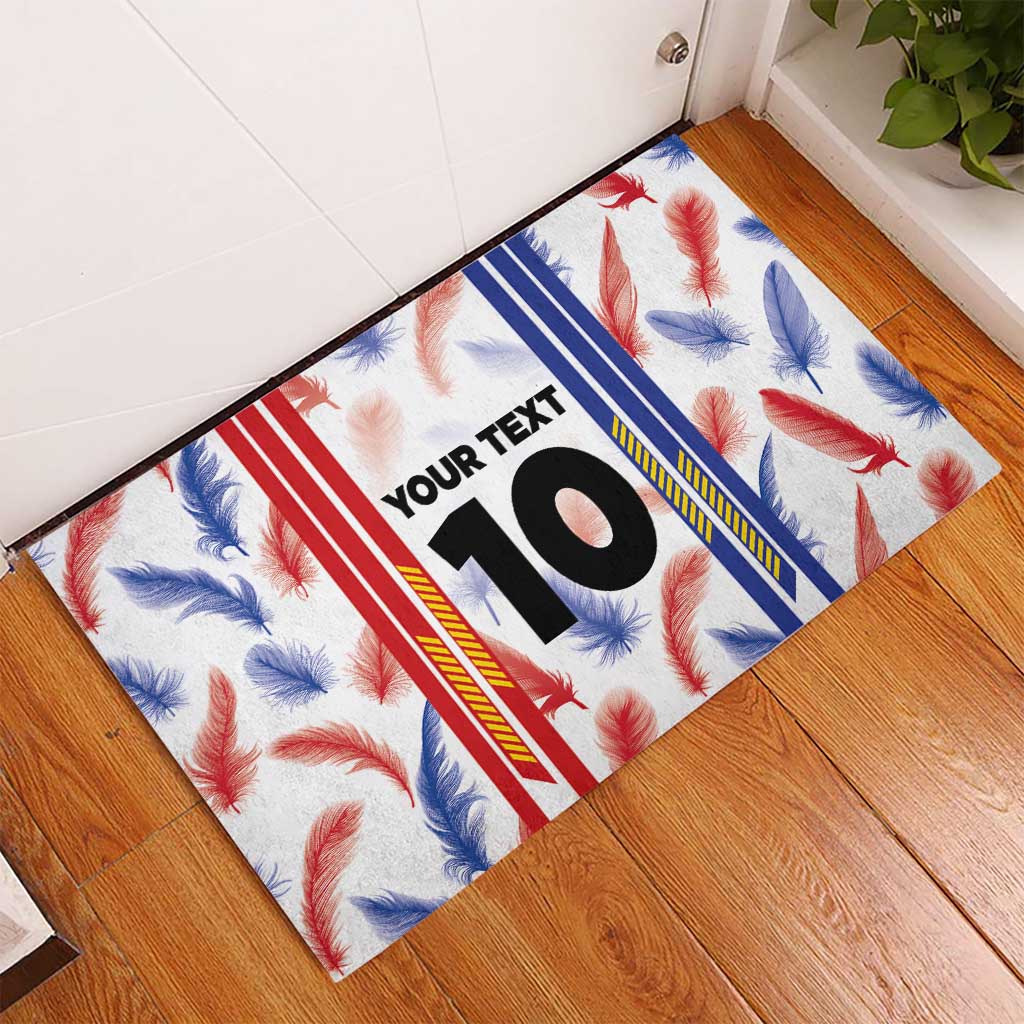 Custom rubber doormat with white feather pattern, bold number 10 and blue red stripe accents