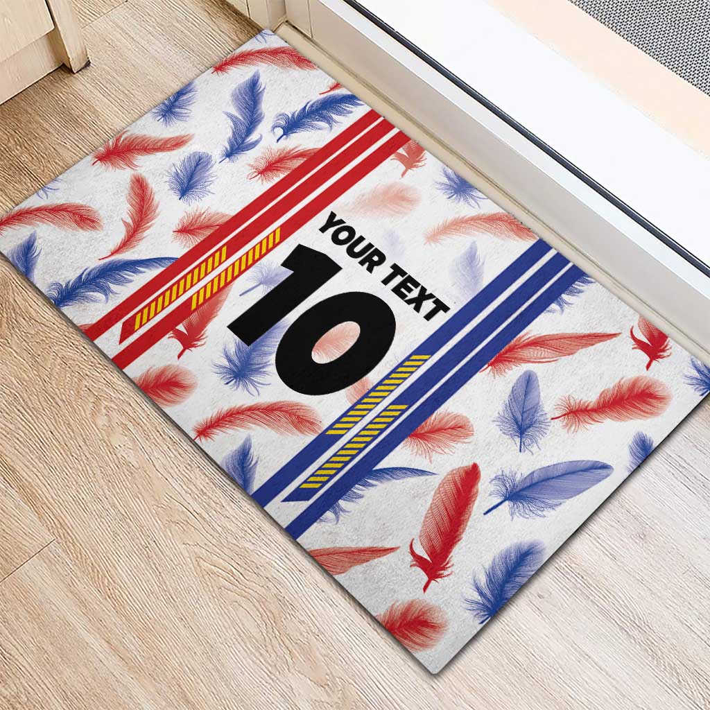 Custom rubber doormat, corner view, white feather print with number 10 and trim stripes