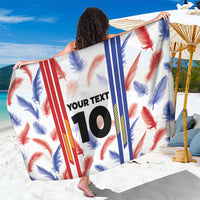 White sarong with red/blue feather print and striped panel, “YOUR TEXT 10” design