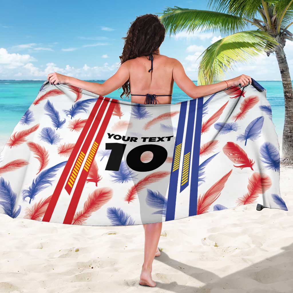 White feather-print sarong with red/blue stripes; “YOUR TEXT 10” centered