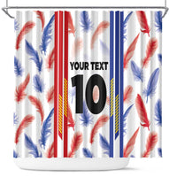 White shower curtain with feather motifs, red/blue stripe bars, and centered 'YOUR TEXT 10'.