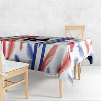 Custom football jersey tablecloth with red, blue, and white feather design and vertical stripes.