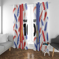 Window curtain panels with red/blue feather pattern and large black “10” centered