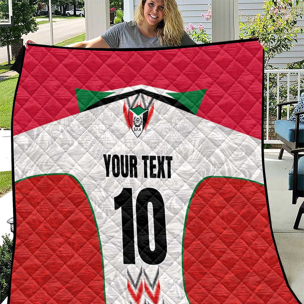 Quilt blanket with red, white, and green football jersey design, number 10, “YOUR TEXT”.