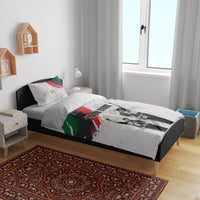 White bedding set on bed with duvet showing black-and-white figures, red/green strokes, “YOUR TEXT”